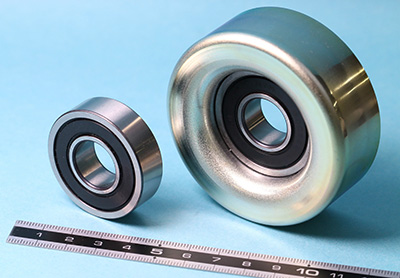 “High Speed Rotation Ball Bearing for Pulley” (left), and after pressed into pulley (right)