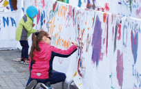 Children drawing pictures on the theme of dreams and friendship