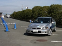 Photo: Test drive of the converted EV equipped with the In-wheel Motor System