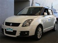 Photo: Exhibit of the test vehicle equipped with the One Motor EV Drive System and the Steering System for Steer-by-Wire