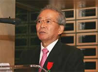 Photo: Greetings by Chairman Suzuki