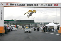 Photo: “Converted EV equipped with the In-wheel Motor System” during demonstration tests as an official Iwata City vehicle