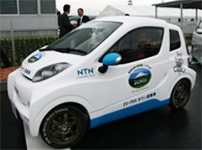 Photo: The compact, two-seater EV &ldquo;Fujinokuni EV, PHV Town Concept Demonstration Vehicle&rdquo; equipped with the in-wheel motor