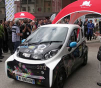 Photo: The two-seater compact EV equipped with the In-Wheel Motor<br>System starting demonstration tests in Annecy, France