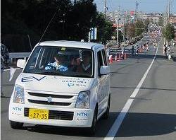 Photo: Converted EV leading the marathon runners