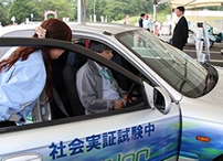 Photo: &ldquo;Converted EV equipped with the In-wheel Motor System&rdquo; that was used for test drives