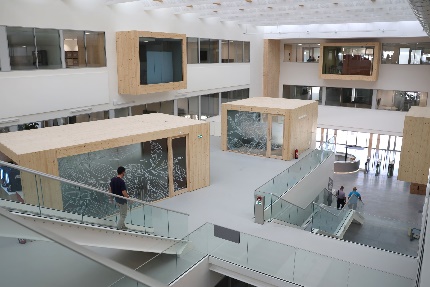 Photo:Bright and open office space with a timber-based design