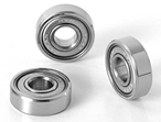 Bearings prelubricated for a vacuum environment